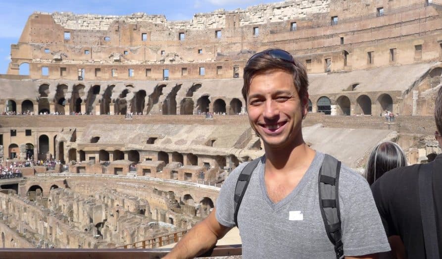 Jason Moore standing in the Roman Colosseum