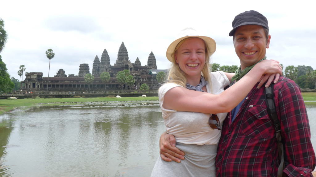 My wife and I at Angkor Wat living my bohemian business life through my travel blog and podcast!